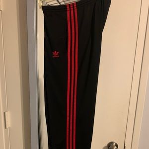 Mens adidas polyester track pants, size small